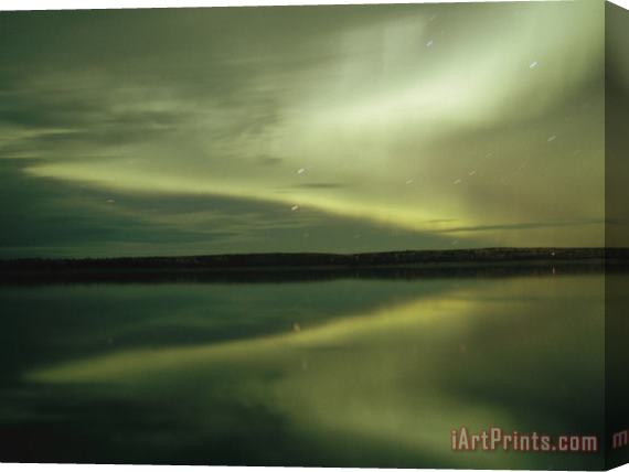 Raymond Gehman The Aurora Borealis Is Reflected Brightly in The Mackenzie River Stretched Canvas Painting / Canvas Art