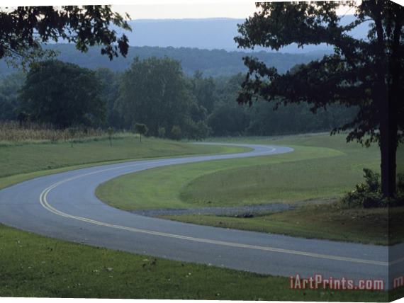 Raymond Gehman View of a Curve in a Road at Fort Frederick State Park Stretched Canvas Print / Canvas Art