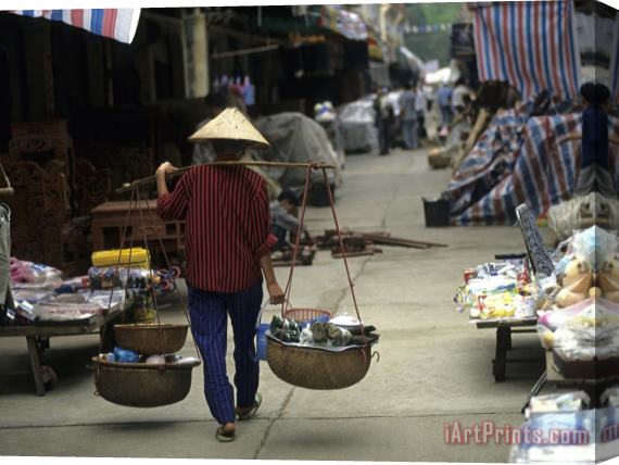 Raymond Gehman Woman with Bamboo Hat Carries Balanced Baskets Pingxiang Market Stretched Canvas Print / Canvas Art